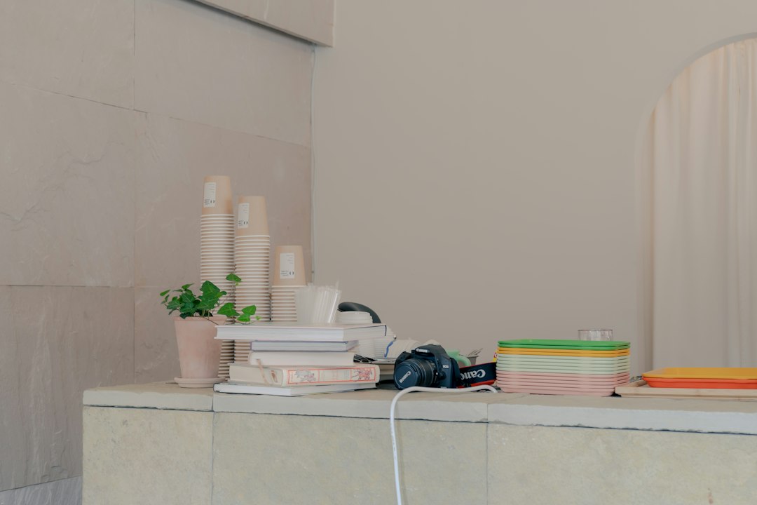 Illustration of a skin maintenance routine checklist with four core bottles—cleanser, hydrating serum, moisturizer, and daily SPF—arranged left to right on a minimal counter